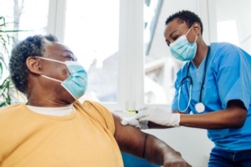Woman receiving vaccine